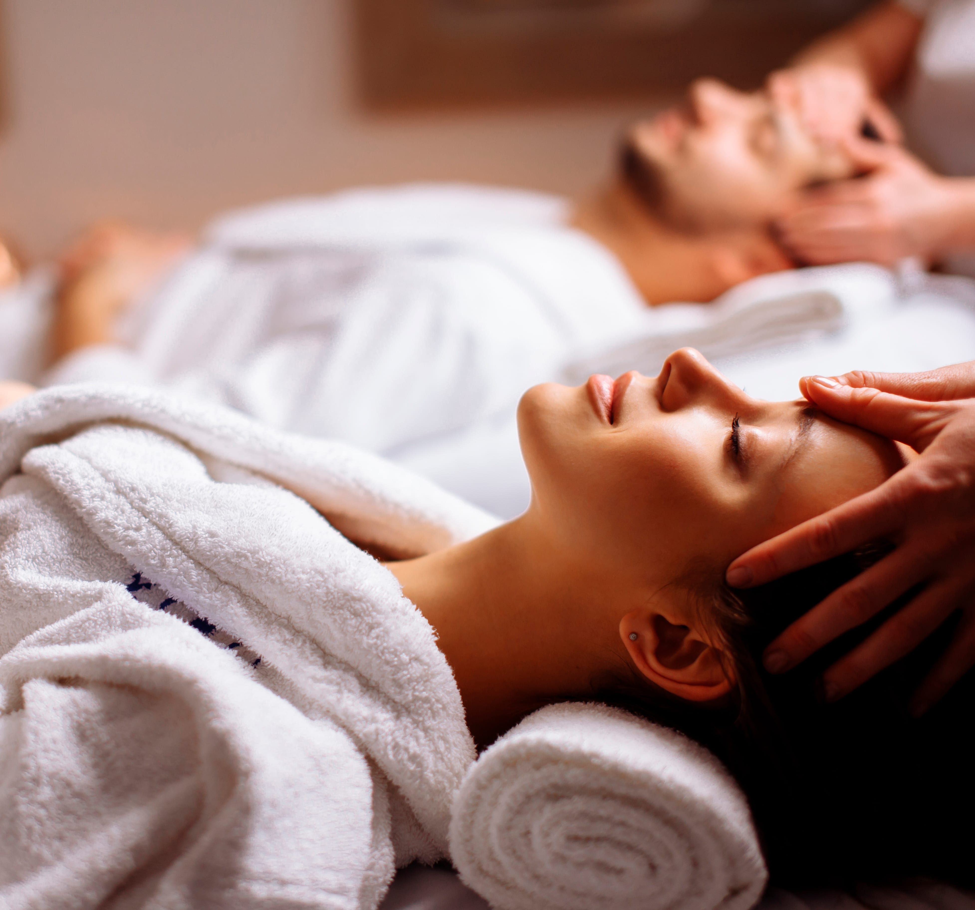 Couple enjoying a relaxing spa treatment in luxurious surroundings | MSC Cruises