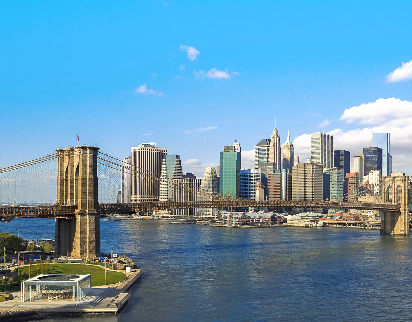 Brooklyn Bridge and Manhattan skyline under a clear blue sky | MSC Cruises Brooklyn Bridge and Manhattan skyline under a clear blue sky | MSC Cruises