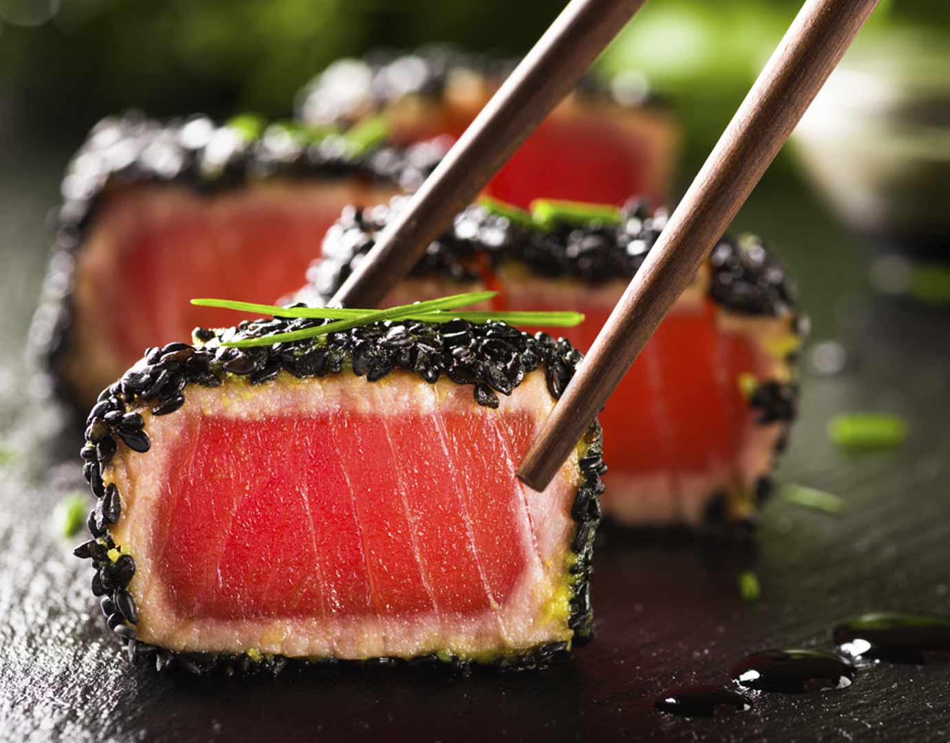 Seared tuna with black sesame crust served with chopsticks | MSC Cruises Seared tuna with black sesame crust served with chopsticks | MSC Cruises