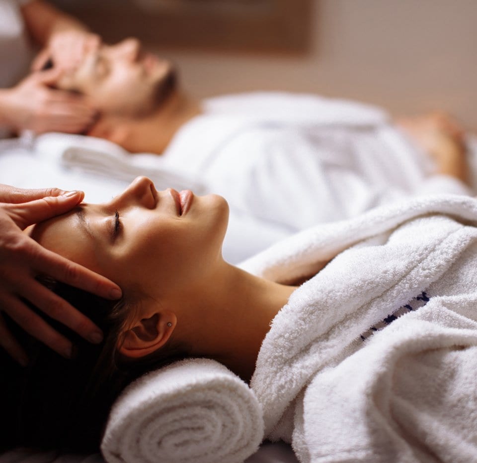 Two guests relaxing during a luxurious spa treatment onboard | MSC Cruises Two guests relaxing during a luxurious spa treatment onboard | MSC Cruises
