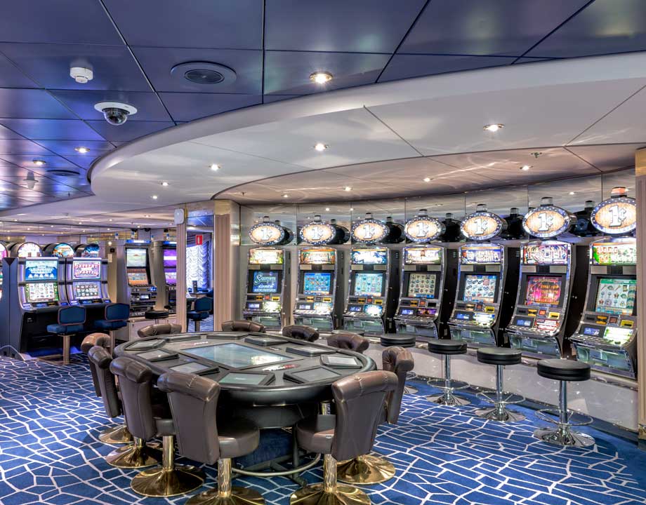 Luxurious casino with slot machines and gaming tables onboard | MSC Cruises Luxurious casino with slot machines and gaming tables onboard | MSC Cruises